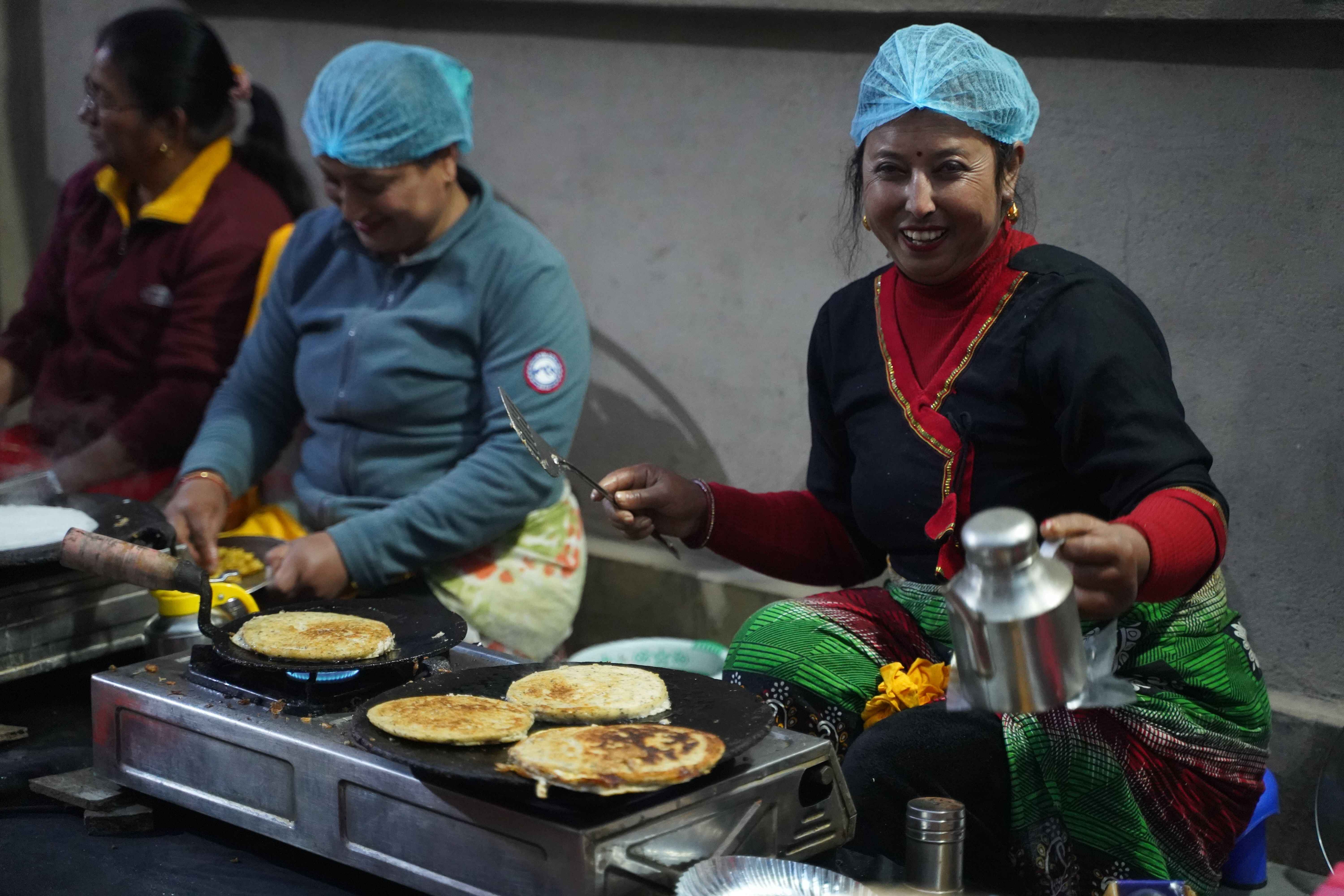 Nepali family making food